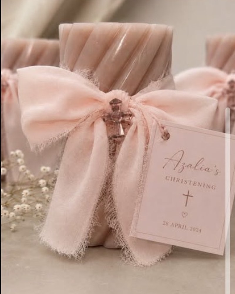 Blush christening favour with ribbon and cross charm